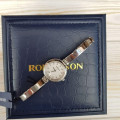Купити ГОДИННИК ROMANSON RM7A21LL ⌚ Наручні годинники на fabrikachasov.com ⭐ Безкоштовна доставка по Україні від 3000 грн ✈ Гарантія ✔ 10.000 моделей. Знижки!